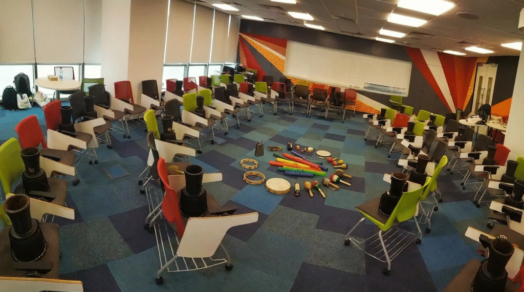 team drumming activity in office